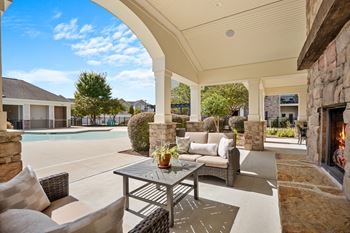 Pool house cabana with outdoor kitchen/grilling pavilion